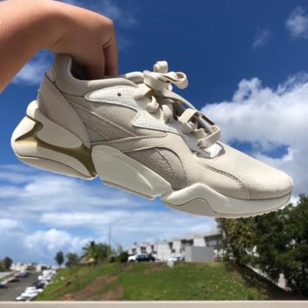 PUMA gold & cream sneakers with sparkle detailing